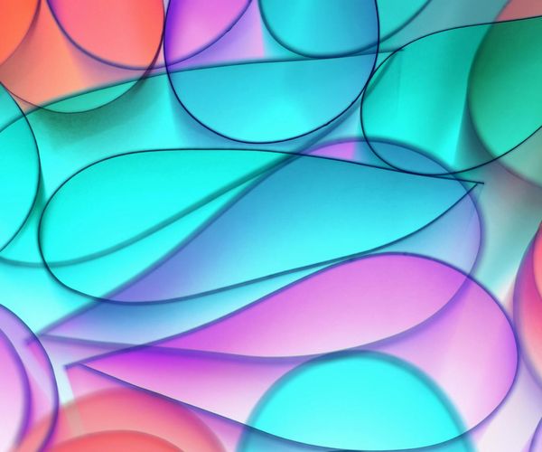 Abstract glowing geometric shapes in teal and blue colors